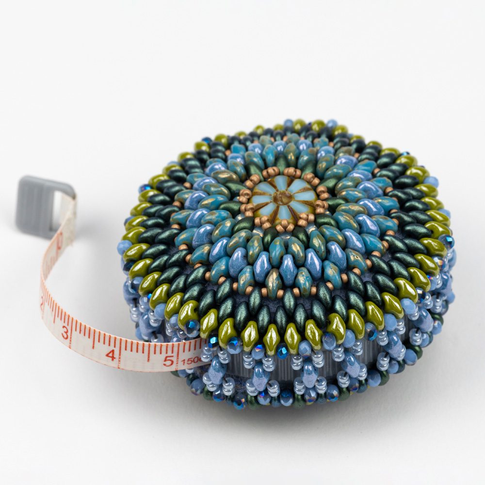 A tape measure with beads on it